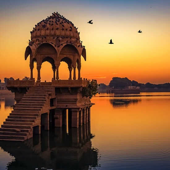 Gadisar Lake At Jaisalmer Rajasthan With Ancient Temple Architecture At Sunrise
