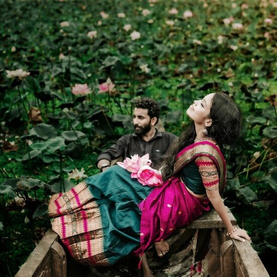 Couple enjoying boat ride in Kerala lake